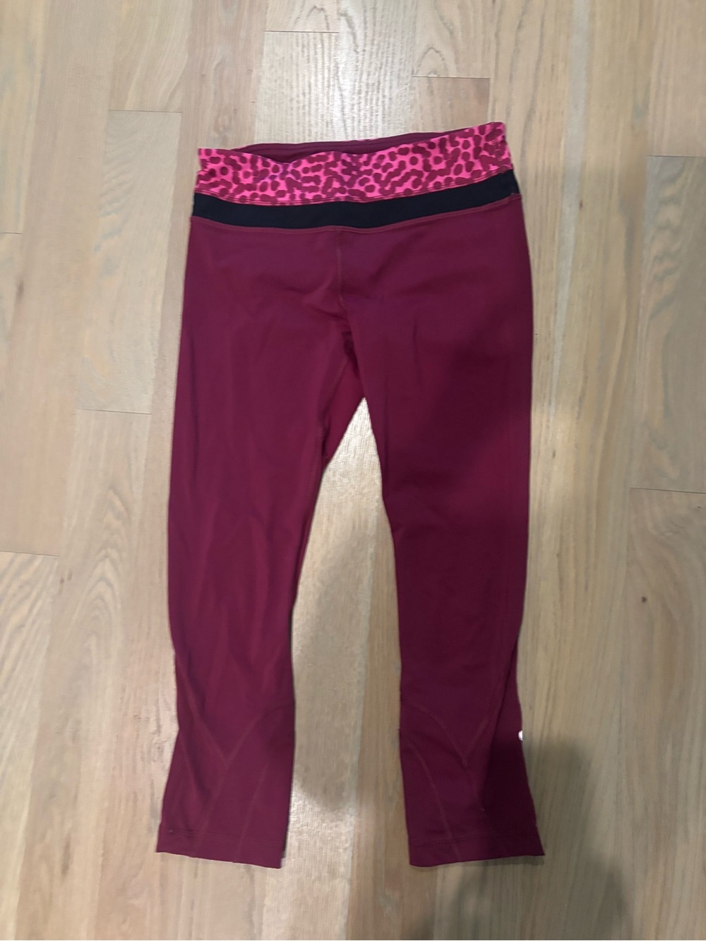 lululemon athletica size 4 Burgundy Capri Leggings with Pink Leopard Waistband